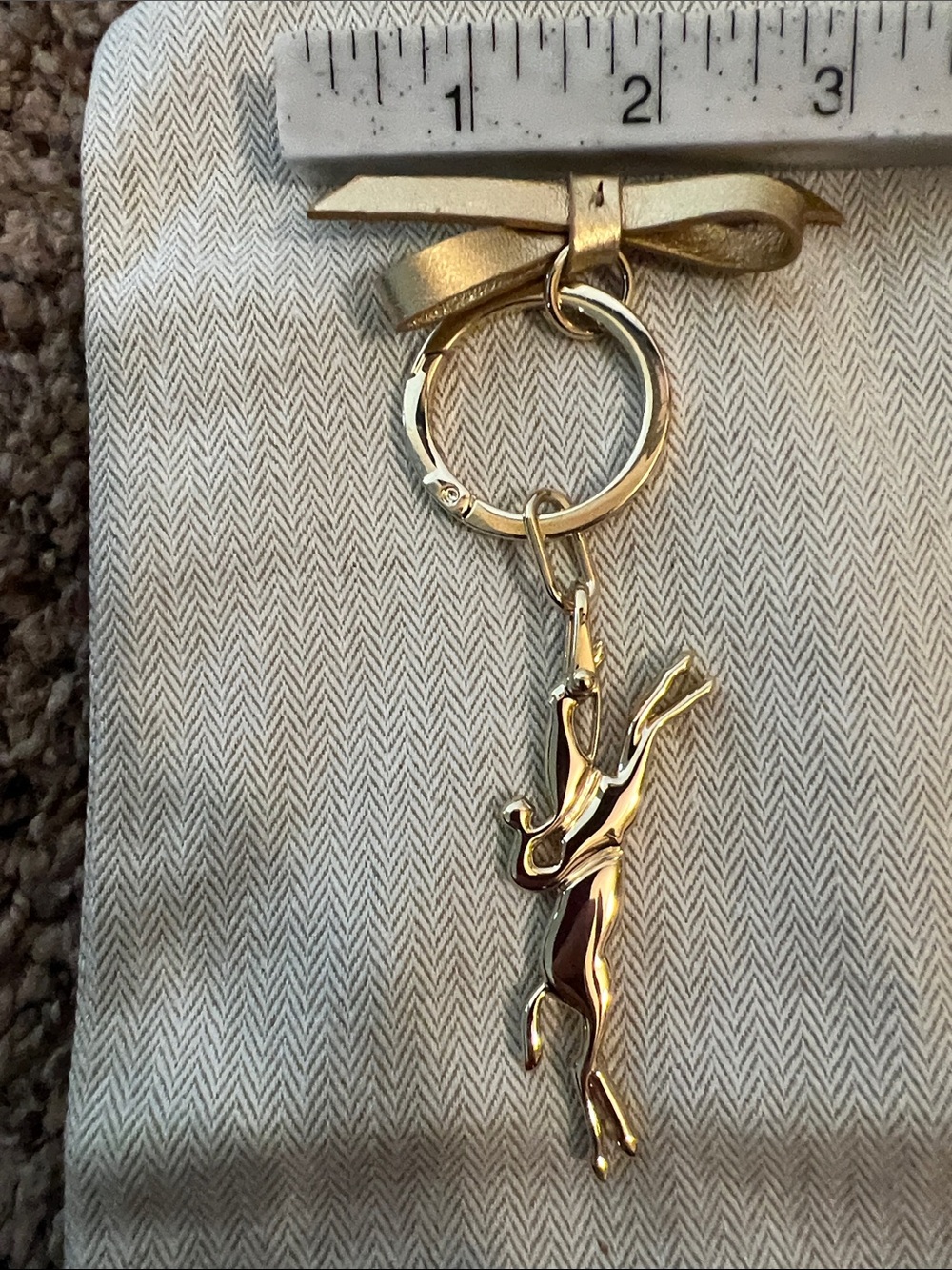 Gold-tone Running Deer Keychain with Bow Accent - Picture 8 of 9